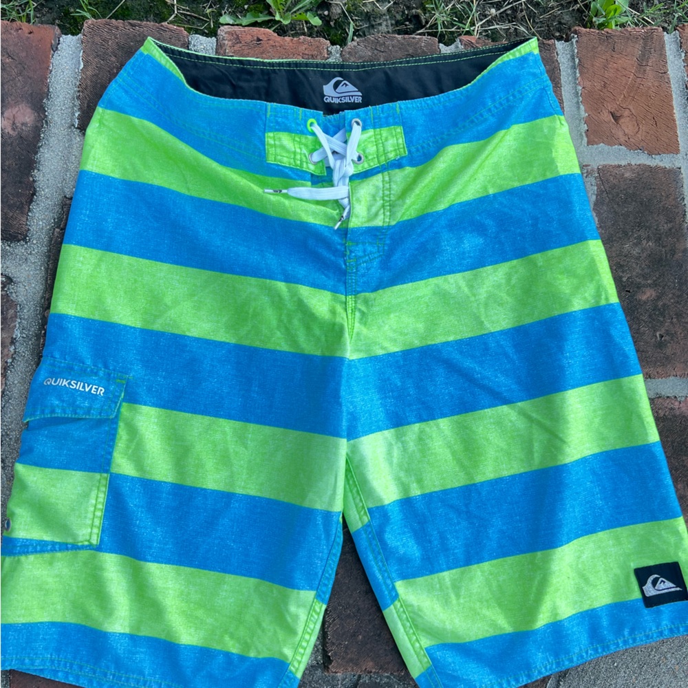 Quick silver blue & green board shorts size 36